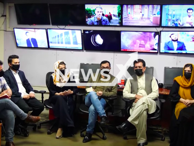 Afghan male news presenters wear masks on-air in solidarity as the Taliban ordered women anchors to cover their faces. Note: Picture is a screenshot from a video (Newsflash)