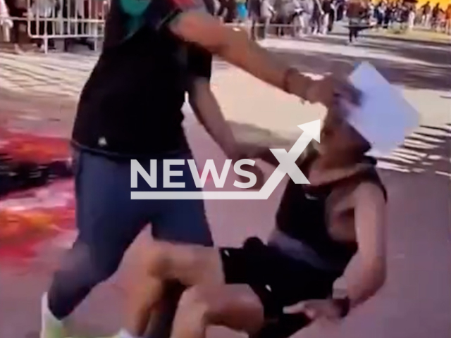 An elderly man is knocked to the ground after an organizer blocked his path in Huamantla, Mexico. He was nit registered to  race. Note: Photo is a screenshot from a video. (Newsflash/NX)