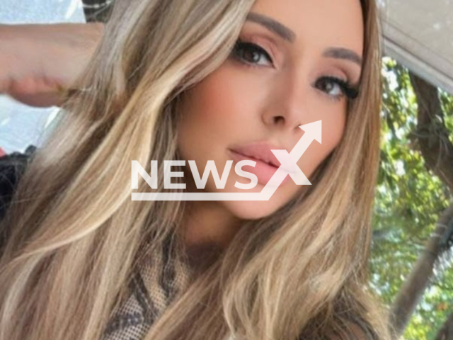 Andreia Vieira Gaspar, 51, poses in undated photo. She died after undergoing plastic surgery in Goiania, Brazil. Note: Private picture. (Newsflash/NX)