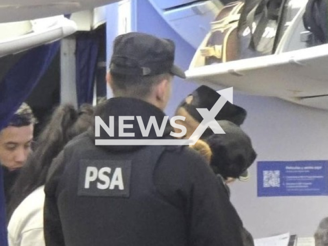 Police arrest a couple on a plane on Saturday, May 9, 2026,  in Rosario, Argentina. A man, 54, and woman, 59, were accused of having sex onboard a plane. Note: Private photo. (Analia Bocassi, Newsflash/NX)