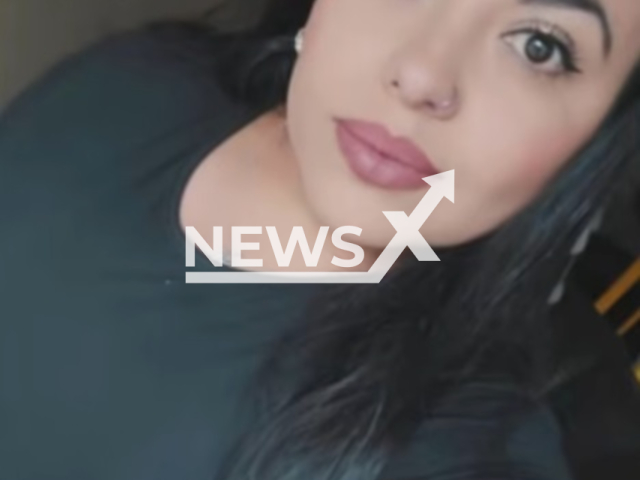 Yenifer Garcia, 33, poses in undated photo. She died during a tattoo session at her home in Bogota, Colombia. Note: Private photo. (Newsflash/NX)