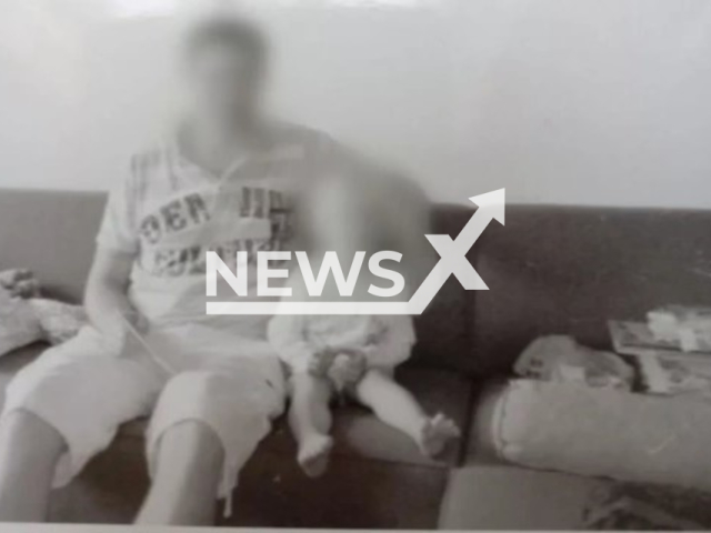 Picture shows  Simon with one of his donor children, undated. Dutch mass donor Simon says he has fathered at least 199 children. Note: Private photo used in local media. (Newsflash/NX)