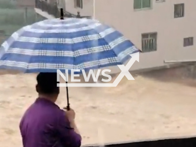 House collapses due to severe floods in Xianyou County, Fujian Province in China. Note: Photo is a screenshot from a video. (Harrisons)