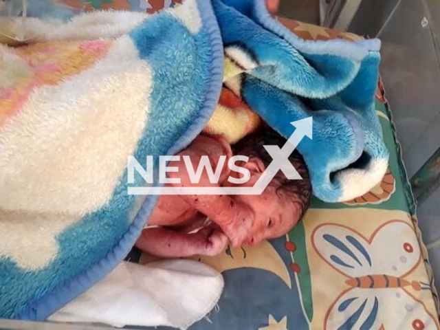 A newborn baby who was found alive in a black plastic bag inside a trash bin in the Nazi Abad neighbourhood of Tehran, Iran, was admitted to a hospital. Note: Private picture (Newsflash)