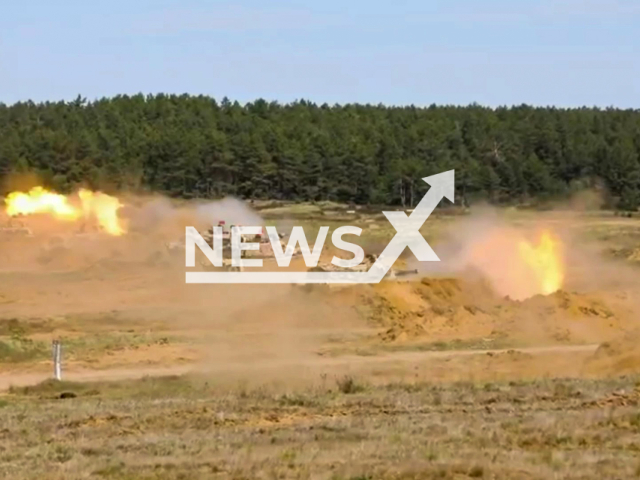 U.S. Army Soldiers assigned to 3rd Armored Brigade Combat Team, 4th Infantry Division, and Polish Soldiers execute a multi-national force on force live-fire exercise as part of Defender Europe 2022, Drawsko Pomorskie, Poland. on May 17, 2022. Note: Photo is a screenshot from the video (Sgt. Andrew Greenwood, DVIDS/Newsflash)