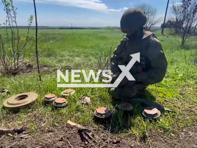 Russian soldiers demining of settlements in the Kharkiv region in May 2022. Note: Photo is a screenshot from a video(Ministry of Defense of Russia/Newsflash).