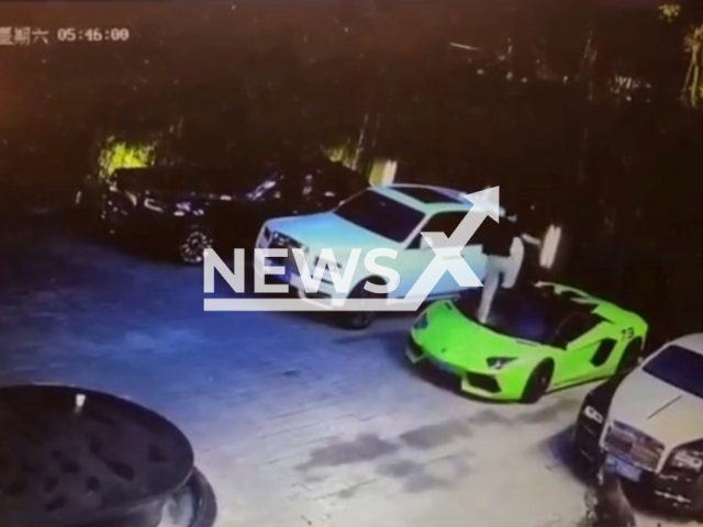 Man kicks and jumps on parked luxury cars in Chengdu, China. Note: This picture is a screenshot from the video (AsiaWire).