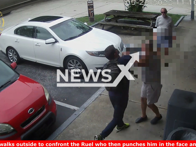 Sean Ruel 39, punching elderly man in the face on the 22nd of May 2022 in Palm Coast, Florida. Note: This picture is a screenshot from the video (Flagler County Sheriff's Office/Newsflash).