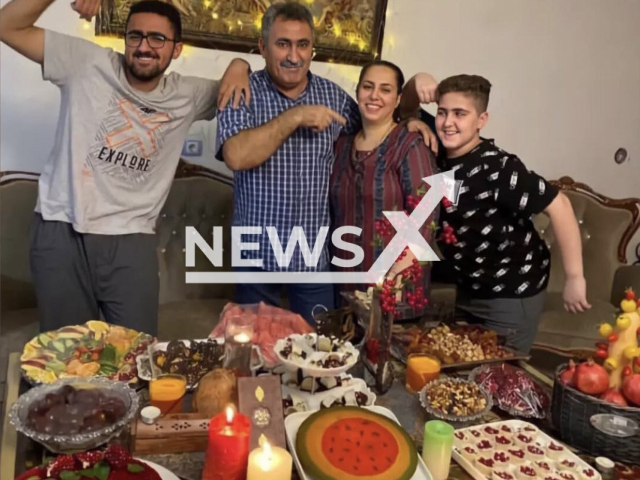 Erfan Jalilian (left) and Arian Jalilian (right), the brothers who were found embracing each other under the rubble of the collapsed highrise building in Abadan, Iran, were pictured together with their father Fawzi Jalilian, who was also found dead under the rubble, and their mother who is the only one left from the family. Note: Private picture (Newsflash)