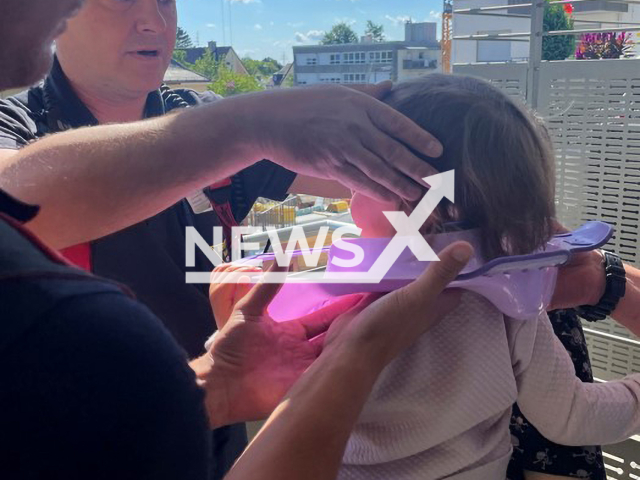 Little Nina (2) got stuck with her head in the toilet seat while playing with her mother, and the Fire-brigade in Munich rescued her. Note: Fire-Brigade photo(Berufsfeuerwehr Munchen/Newsflash).