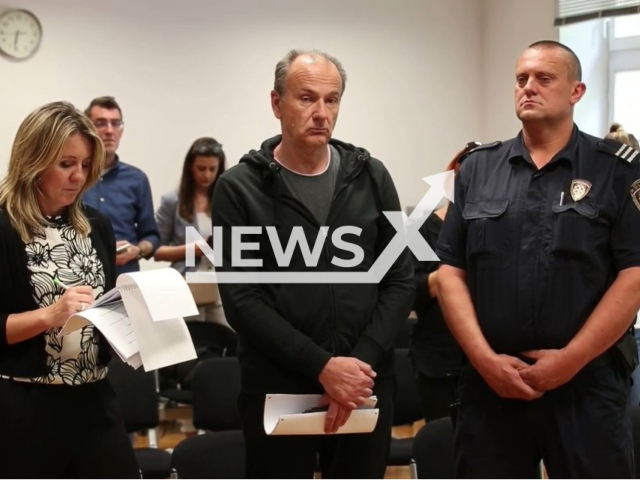 Harald Kopitz (center) on the trial in the District Court in Zagreb, Croatia, where he got maximum penalty of 50 years in prison for the murder of his three children at the end of September 2021. Note: Photo is a screenshot from a video(Newsflash).