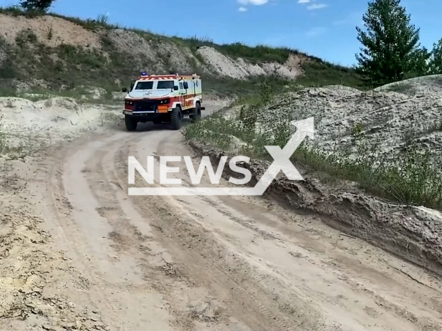 Only a few minutes from the daily and very dangerous work of pyrotechnics of the SES in the Donetsk region in June 2022. Note: This picture is a screenshot from the video (@MNS.GOV.UA/Newsflash).