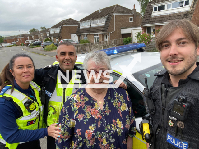 Annie Skinner,  with officers Sam Cholerton, (left) Sargent Tarj Nizzer (second left) and PC Alex Bonnifac, (right)  after she handed the cash she found outside a Morrisons in  Swadlincote, UK, on 26th April.  
 Note: Police photo. (SwadlincoteSNT/Newsflash)