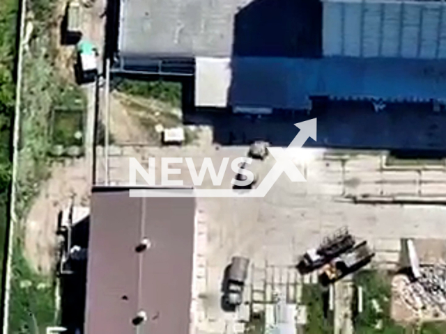 Soldiers of the 40th Artillery Brigade apparently destroy the warehouse and cars of the enemy.  Note: This picture is a screenshot from the video (@40OAbrigade/Newsflash).