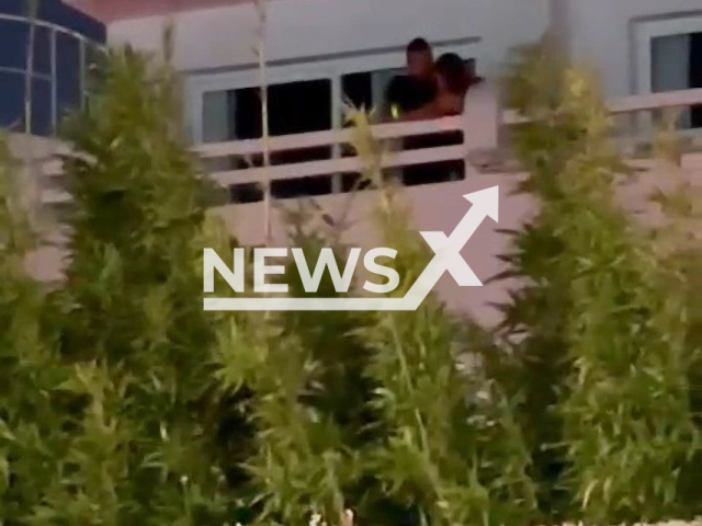 Tourist arrested after beating his girlfriend on the balcony of a hotel room in Platja d'en Bossa, Ibiza, in June 2022. Note: Picture is a screenshot from a video (@policiasantjosep/Newsflash)