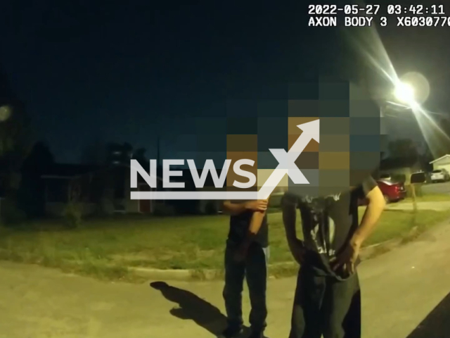 SAPD Officer's bodycam showing three men that heard the gunshots in the backyard of their home, on the 27th of May, in San Antonio, Texas. Note: Picture is a screenshot from a video (San Antonio Police Department/Newsflash)