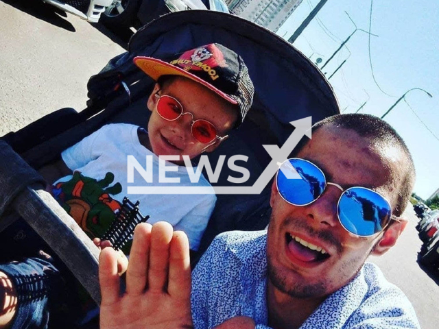 Leonid Kudryavtsev, 24, pictured with his two-year-old son who he threw out of the window from the fifth floor of a building in Moscow, Russia on the 4th of August. Note: Private picture (Newsflash)