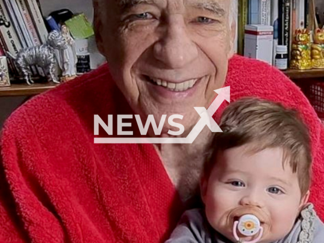 Alberto Cormillot with son Emilio,  9-month-old who has a a private teacher who teaches him Chinese. Note: Private photo.  (@drcormi/Newsflash)