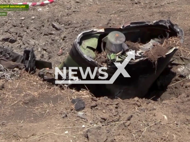 At the scene after Ukrainian Forces used a tactical missile against the inhabitants of the village of Khoroshee, in Ukraine. Note: Photo is a screenshot from the video (@millnr/Newsflash)