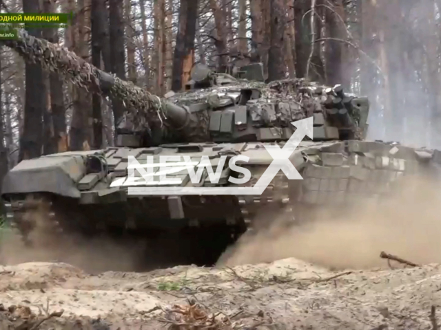 Combat work of separate tank battalion of Peoples Militia of the LPR in Ukraine.Note: This picture is a screenshot from the video (@millnr/Newsflash).