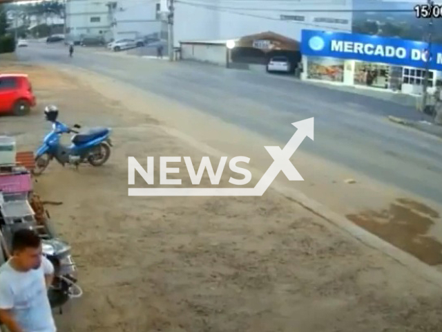 Man drops beer to prevent runaway car from reaching market in Rio do Sul, Brazil, on 15th June, 2022. Note: Picture is a screenshot from a video (Newsflash)