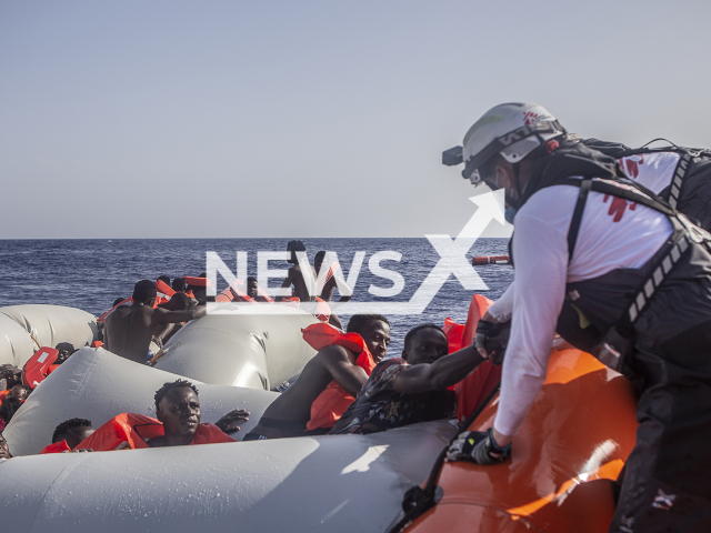 The rescue of  71 people from a rubber boat in distress in the central Mediterranean, by the Medecins Sans Frontieres team on 27th June, 2022. 
Note: Licensed photo.  (Medecins Sans Frontieres/Newsflash)