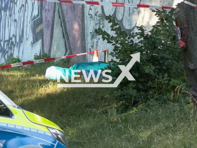 Police do the forensic examination of the 44-year-old's body and the scene where they found it, in Bonn, Germany, on 29th June, 2022. Note: Photo is a screenshot from a video. (Newsflash)