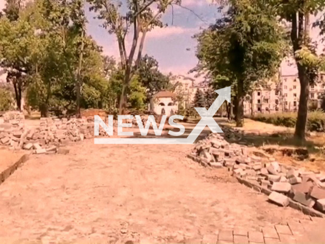 The images show an excavator apparently removing parts of the square near the theatre in the city of Mariupol, in Ukraine. Note: Picture is a screenshot from a video (@andriyshTime/Newsflash)