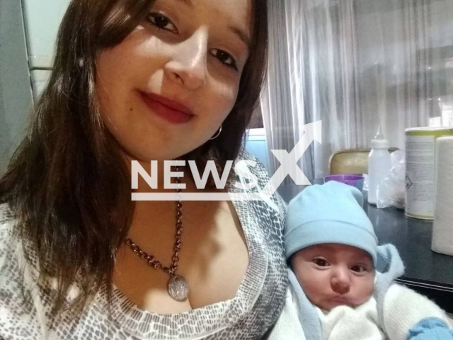 Carla Agostina Trigo, 22, who was murdered after being called to meet with a man to get a job as a nanny in General San Martín, in Mendoza, Argentina, pictured with a baby. Note: Private photo. (Newsflash)