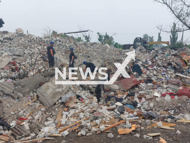 Ukrainian rescuers of the State Emergency Service during search and rescue operations in a five-story residential building, where 24 people died as a result of the rocket attack on the 10th of July, 2022 in the city of Chasiv Yar, in Ukraine. Note: Photo is obtained from the State Emergency Service of Ukraine. (@MNS.GOV.UA/Newsflash)