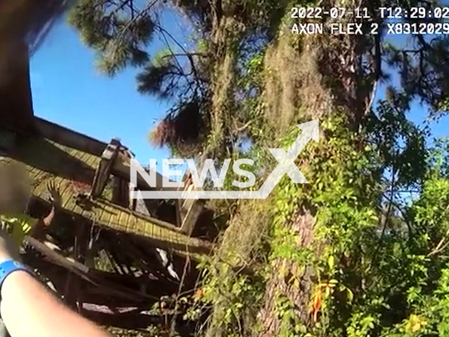 Police Officer's bodycam showing one of the two 12-year-olds that were playing with handgun with his hands up, in Oak Hill, Volusia County, Florida, on the 11th of July, 2022. Note: This picture is a screenshot from the video (Volusia Sheriff's Office/Newsflash).