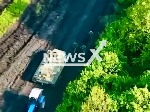 The Armed Forces of Ukraine seized another piece of Russian occupiers equipment and took it to their positions with the help of a tractor in Ukraine.  Note: This picture is a screenshot from the video (@GeneralStaff.ua/Newsflash).