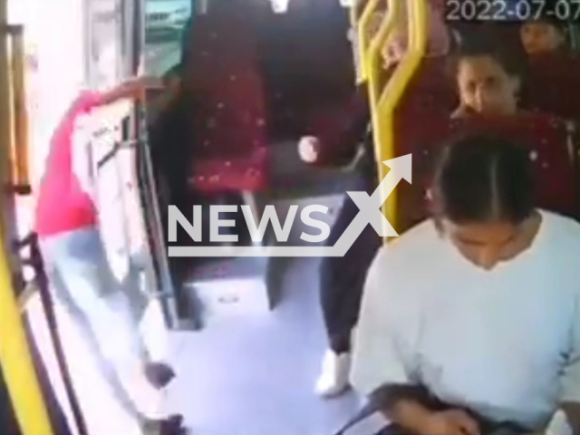 Woman falls from an open door of a moving minibus in Mersin, Turkey. Note: Photo is a screenshot from the video (Newsflash)