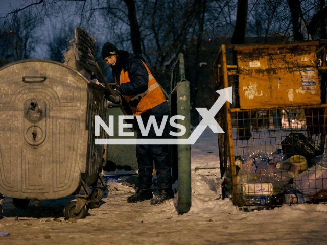 Janitor Yurii Vetlugin at work.  Note: Picture provided by photographer Roman Filippov  (@filippov_photo/Newsflash)