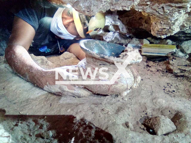 The Mayan pot was recovered in the cave of Cross, in Playa del Carmen, Mexico, July 2022.
Notes: Licenced picture (Cenotes Urbanos Playa del Carmen-INAH/Newsflash)