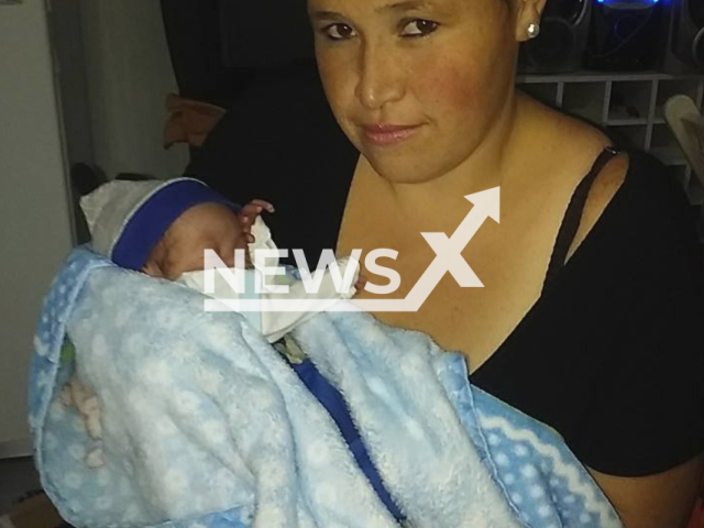 Monica Gallardo with one of her children, she died hugging under the bed at her house on fire, in Comodoro Rivadavia, Argentina, July 2022.
Notes: Private picture (Monica Gallardo/Newsflash)