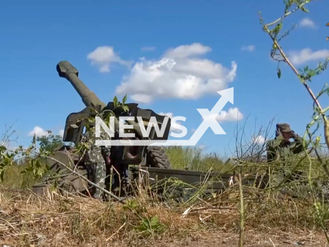 Combat work of the 1st howitzer artillery battery of the People's Militia of the LPR with the People's Militia of the DPR against Ukrainian Army in the area of the Svitlodarsk, in Ukraine. Note: Picture is a screenshot from a video (@nm_dnr/Newsflash)