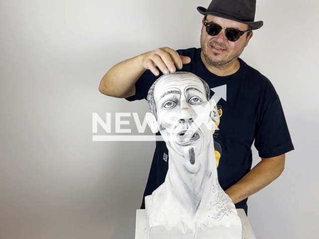 Felix Semper from the United States detaching and displaying his mind-blowing paper sculpture. Note: Picture is a screenshot from a video (@felixsemper/Newsflash)