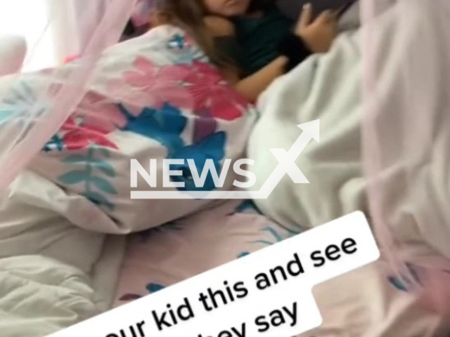 Mum teases daughter telling her she has to fight another girl to protect the family in  Kokomo Indiana, United States on 8 July, 2022. Note: Photo is a screenshot from the video (@candyoaks/Newsflash)