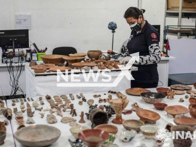 The items given by the family in Spain are seen in Mexico facilities in an undated picture. They are kept by the INAH in the Museum of Templo Mayor.
Notes: Licenced picture (Gerardo Torres-INAH/Newsflash)