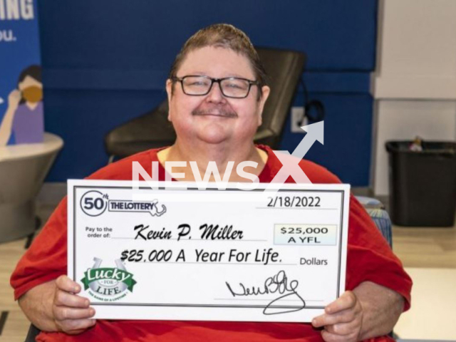 Kevin Miller posing with a check,  on Wednesday, July 20, 2022 at the Massachusetts Lottery headquarters in Dorchester, Massachusetts, USA. He is the  winner of a USD 25,000 a year for life prize in the  Lucky  for Life game , in Montague, Massachusetts, USA.
Note: Photo from Massachusetts State Lottery.  (Massachusetts State Lottery/Newsflash)