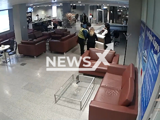 Airport officers carry sports bags of Inessa Brandenburg, which allegedly had stolen money in them, at an airport in undated CCTV footage. Inessa Brandenburg, who was the chairman of the board of one of the Tyumen banks, allegedly stole about GBP 8 million and fled Russia in 2018. Note: Picture is a screenshot from a video (Ministry of Internal Affairs of Russia/Newsflash)