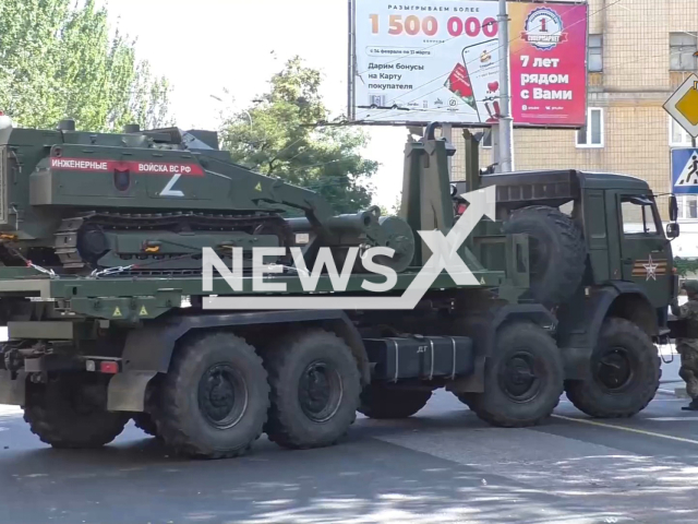 Picture shows a loader with robotic complex Uran-6 on it in Donetsk, Ukraine, Sunday, July 31, 2022. Sapper groups of the Ministry of Emergency Situations of the DPR, together with the engineering troops of Russia, demined the central part of the city. Note: Picture is a screenshot from a video (@nm_dnr/Newsflash)