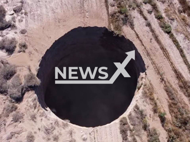 Picture shows a  sinkhole  in the Tierra Amarilla community, Chile, in a screen from an undated  video. The authorities investigated whether this was caused by mining activity in the area.
 Note: Photo is a screenshot from a video. (Newsflash)