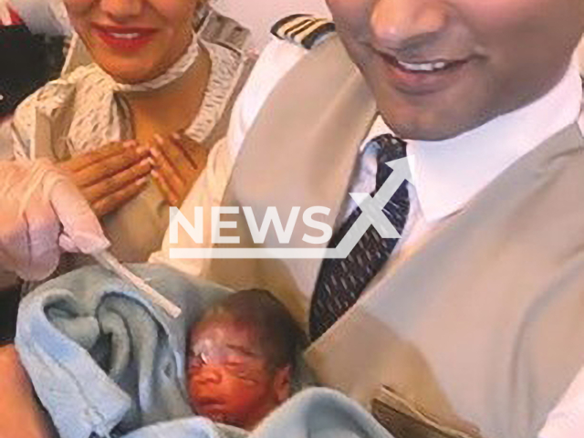 Picture shows members of the flight crew posing with the baby who was born on board a Kuwaiti AirLine flight KU417 on Tuesday, Aug. 2, 2022. The flight was bound for Manila city, Philippines. Note: Private photo. (Newsflash)