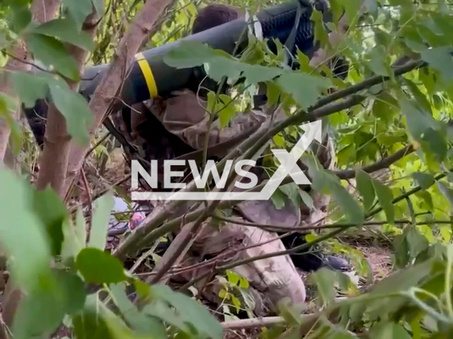 Soldier of Azov Special Operations Detachment aims a Javelin portable anti-tank missile system in a forest area in Ukraine in an undated photo. Javelin is a fire-and-forget missile with lock-on before launch and automatic self-guidance. Note: This picture is a screenshot from the video (@AFUStratCom/Newsflash).