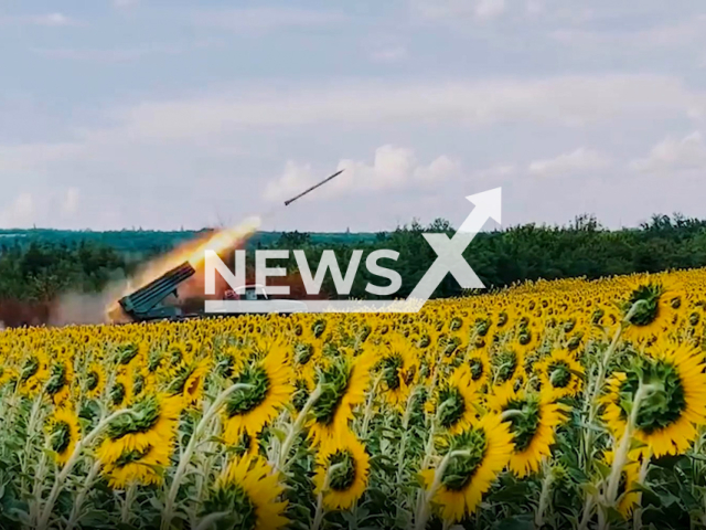 Grad multiple rocket launcher system shoots in sunflower field, Ukraine in an undated photo. Soldiers of the rocket artillery battalion of the 58th separate motorized infantry brigade named after hetman Ivan Vyhovskyi used the Grad against Russian troops in Ukraine. Note: This picture is a screenshot from the video. (@58OMPBr/Newsflash)