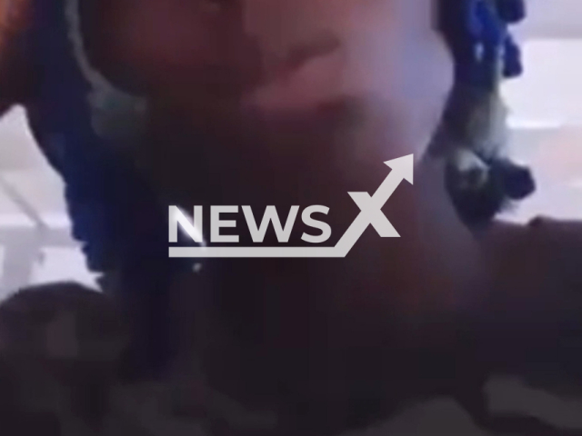 An Italan restaurant owner assaults a Nigerian woman after she asks to be paid for her work in Soverato, Italy, in undated footage. The woman, mother of a 4-year-old child, was transferred to the emergency room for her injuries. Note: Picture is a screenshot from a video (Newsflash)