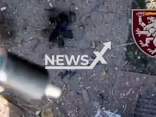 Paratroopers of the 80th Separate Airborne Assault Brigade drops a bomb from a drone on a group of Russian soldiers in Ukraine in undated footage.
The 80th Separate Air Assault Brigade is an airmobile formation of the Ukrainian Air Assault Forces. 
Note: Picture is a screenshot from a video (@ChernihivTCKtaSP/Newsflash)