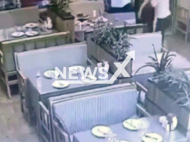 A waiter performs Heimlich Manoeuvre on a customer in Ankara, Turkey, in undated footage. It was reported that the customer got food into his windpipe and therefore had difficulty in breathing. Note: Photo is a screenshot from the video (Newsflash)